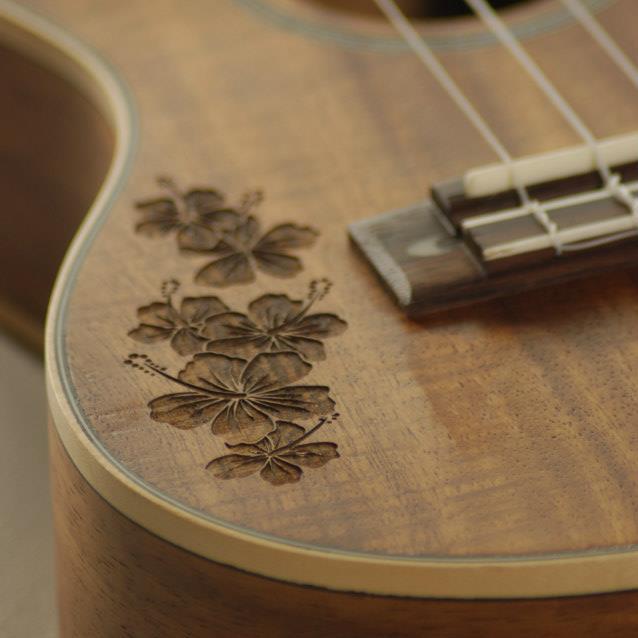 Engraved Ukuleles and Guitars.