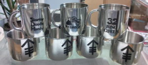 We custom engrave and print on Stainless Mugs!